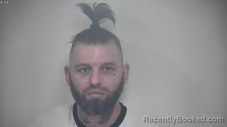 Mugshot of JOSHUA DECOADA TAYLOR