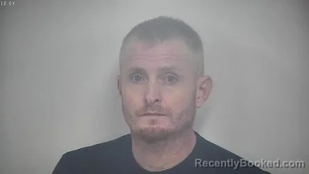 Mugshot of JUSTIN CARROLL WOOD