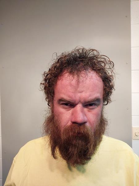 Mugshot of Dustin Lee Hughes