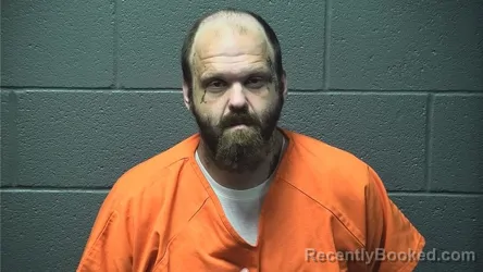 Mugshot of Justin William Menefee booked in Warren County, Virginia on October 7, 2026