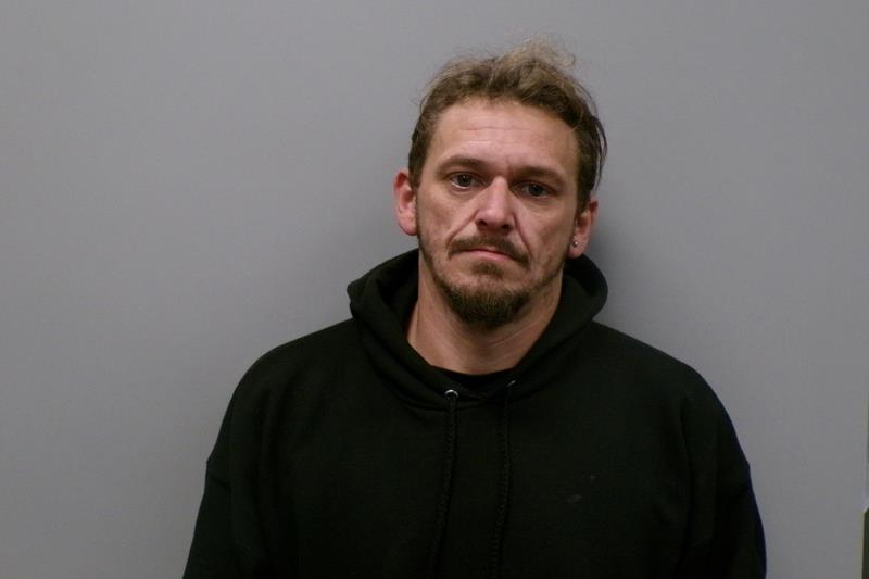 Mugshot of Travis Daniel Romans