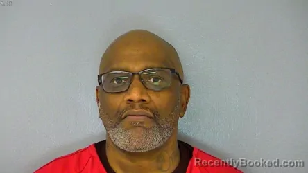 Mugshot of CARLOS REMANS WOODHOUSE