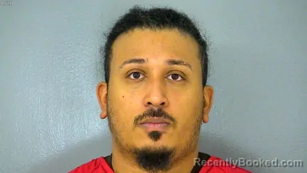 Mugshot of REGINALD WELTON TUNIA