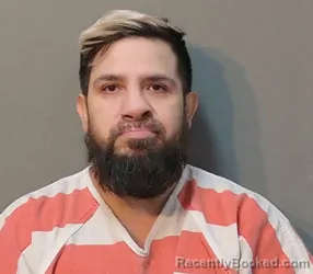 Mugshot of John Eric Sandoval booked in Franklin County, Texas on August 21, 2026