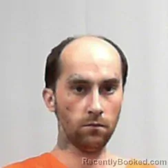 Mugshot of Dustin Shane Heck booked in Cabell County, West Virginia on March 18, 2026