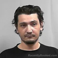 Mugshot of Logan Clay Burns booked in Cabell County, West Virginia on May 7, 2026