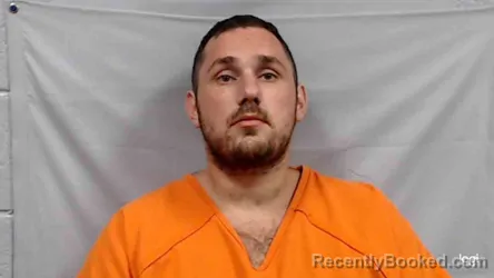 Mugshot of Brennan Eugene Rhodes booked in Fayette County, West Virginia on July 27, 2026