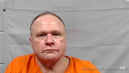 Mugshot of Russell Duane Tuck