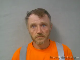 Mugshot of John Michael Isner booked in Gilmer County, West Virginia on July 30, 2026