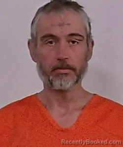 Mugshot of Harvey Lee Costello