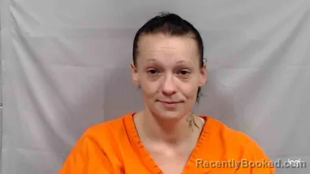 Mugshot of Jacqueline Faye Burgess booked in Greenbrier County, West Virginia on August 12, 2026