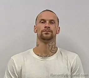 Mugshot of Justin Edward Cook booked in Hardy County, West Virginia on May 20, 2026