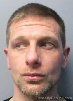 Mugshot of Justin Michael Ahearn booked in Jefferson County, West Virginia on April 1, 2026