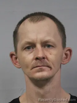 Mugshot of Adam Wade Layton