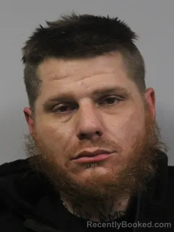 Mugshot of Henon Wesley Snodgrass
