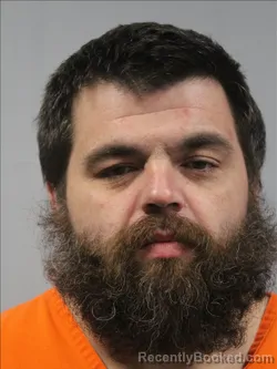 Mugshot of Justin Lee Carpenter