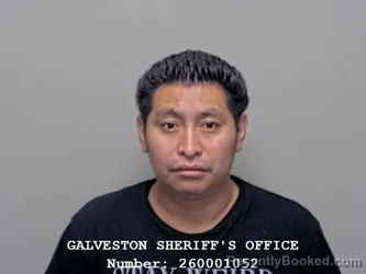 Mugshot of Julio Cesar Argueta Izpez booked in Galveston County, Texas on September 15, 2026