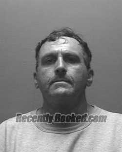 Booking photo from Galveston County, Texas