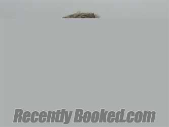 Booking photo from Galveston County, Texas