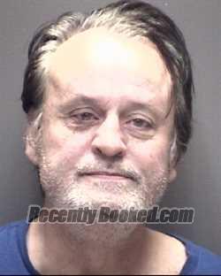 Booking photo from Galveston County, Texas