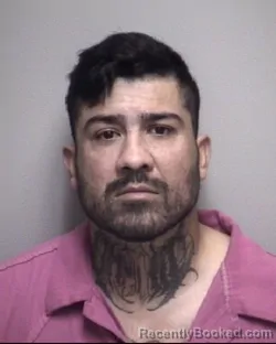 Mugshot of OMAR . MEDRANO