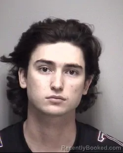 Mugshot of XAVIER RENE MARTINEZ