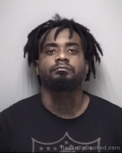 Mugshot of HARRISON . RENTERIA