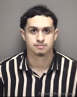 Mugshot of CARLOS ERNEST CANAS
