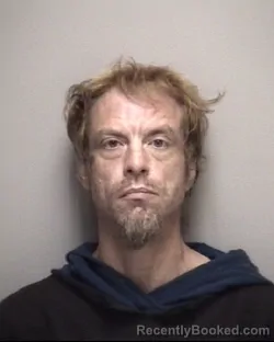 Mugshot of WILLIAM . MCGUGIN