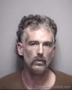 Mugshot of DENNIS JUSTIN MAXWELL