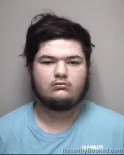 Mugshot of LANDON RYAN HUGHES