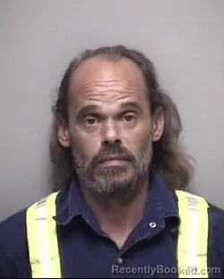 Mugshot of ERNEST NICHOLAS GODCHEAUX