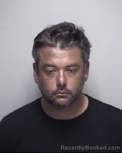 Mugshot of JUSTIN LEE WAINSCOTT