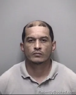 Mugshot of RAYMOND PAUL ALVARADO booked in Galveston County, Texas on March 20, 2026