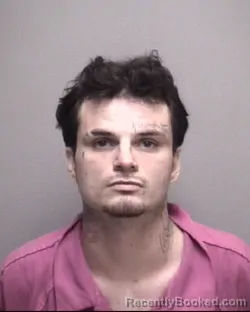 Mugshot of LOGAN TAYLOR DURRETT booked in Galveston County, Texas on April 24, 2026