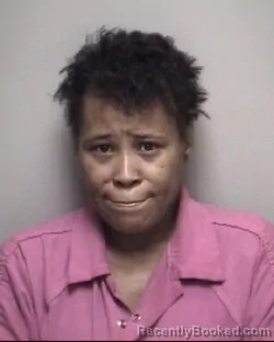 Mugshot of TOMELIA NICOLE WHITE booked in Galveston County, Texas on April 25, 2026