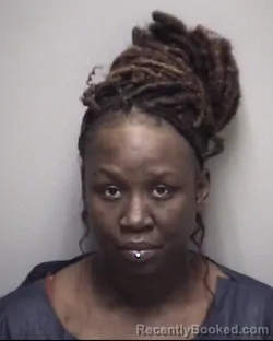 Mugshot of CHHARA JANAI JOHNSON booked in Galveston County, Texas on April 26, 2026