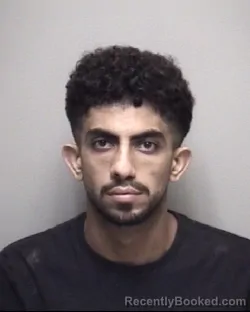 Mugshot of AHMAD HAITHAM ALBUSTANJI booked in Galveston County, Texas on April 28, 2026