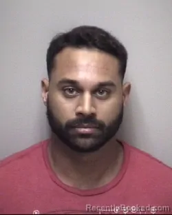 Mugshot of KRIS . RAMLAKHAN booked in Galveston County, Texas on May 2, 2026