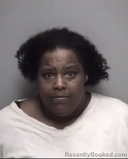 Mugshot of KIMBERLY RACHEL VOSSAH booked in Galveston County, Texas on May 6, 2026