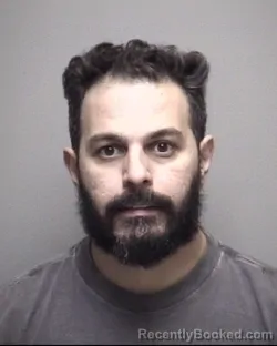 Mugshot of AYMAN ABDEL QADAR booked in Galveston County, Texas on May 7, 2026