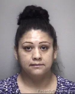 Mugshot of CAROLINA . PERALTA booked in Galveston County, Texas on May 7, 2026