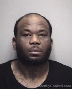 Mugshot of DEXTER RAHEEM ROBINSON booked in Galveston County, Texas on May 8, 2026