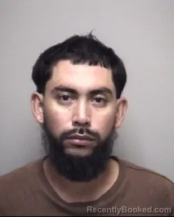 Mugshot of OMAR DEJESUS BRAVO booked in Galveston County, Texas on May 9, 2026