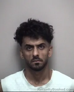 Mugshot of MOHAMMAD NAWEED SULTANI booked in Galveston County, Texas on May 9, 2026