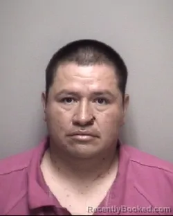 Mugshot of CARLOS A GUTIERREZ FLORES booked in Galveston County, Texas on May 11, 2026