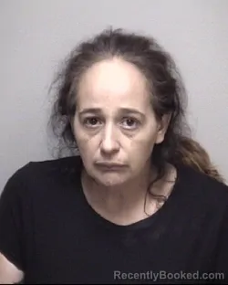Mugshot of KIMBERLEY LYNN URESTI booked in Galveston County, Texas on May 12, 2026