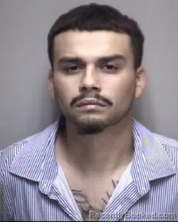 Mugshot of HAYDEN ERIC HINOJOSA booked in Galveston County, Texas on May 12, 2026
