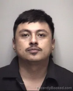 Mugshot of JOSE ELIUD BRIONES booked in Galveston County, Texas on May 14, 2026