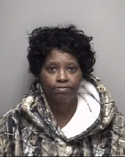 Mugshot of CONNIE ARNETTA BUTLER booked in Galveston County, Texas on May 14, 2026